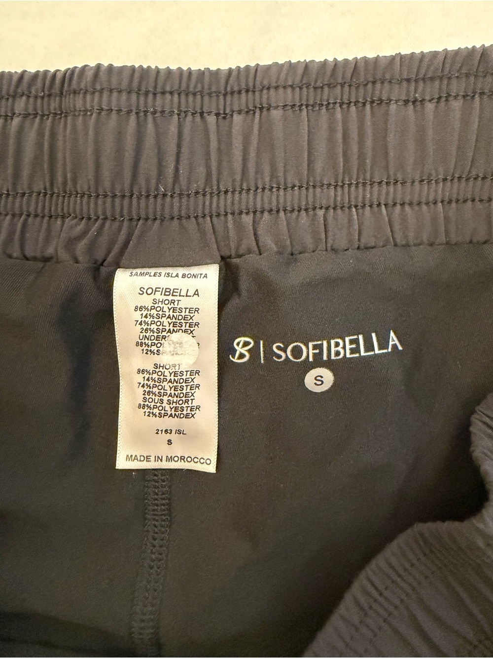 Sofibella Black Women's Active Tennis Shorts side Panel accents in Pastel color - Picture 5 of 7